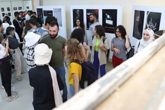 المعرض الفنّي التوعوي في حرم جامعة دمشق-صورة